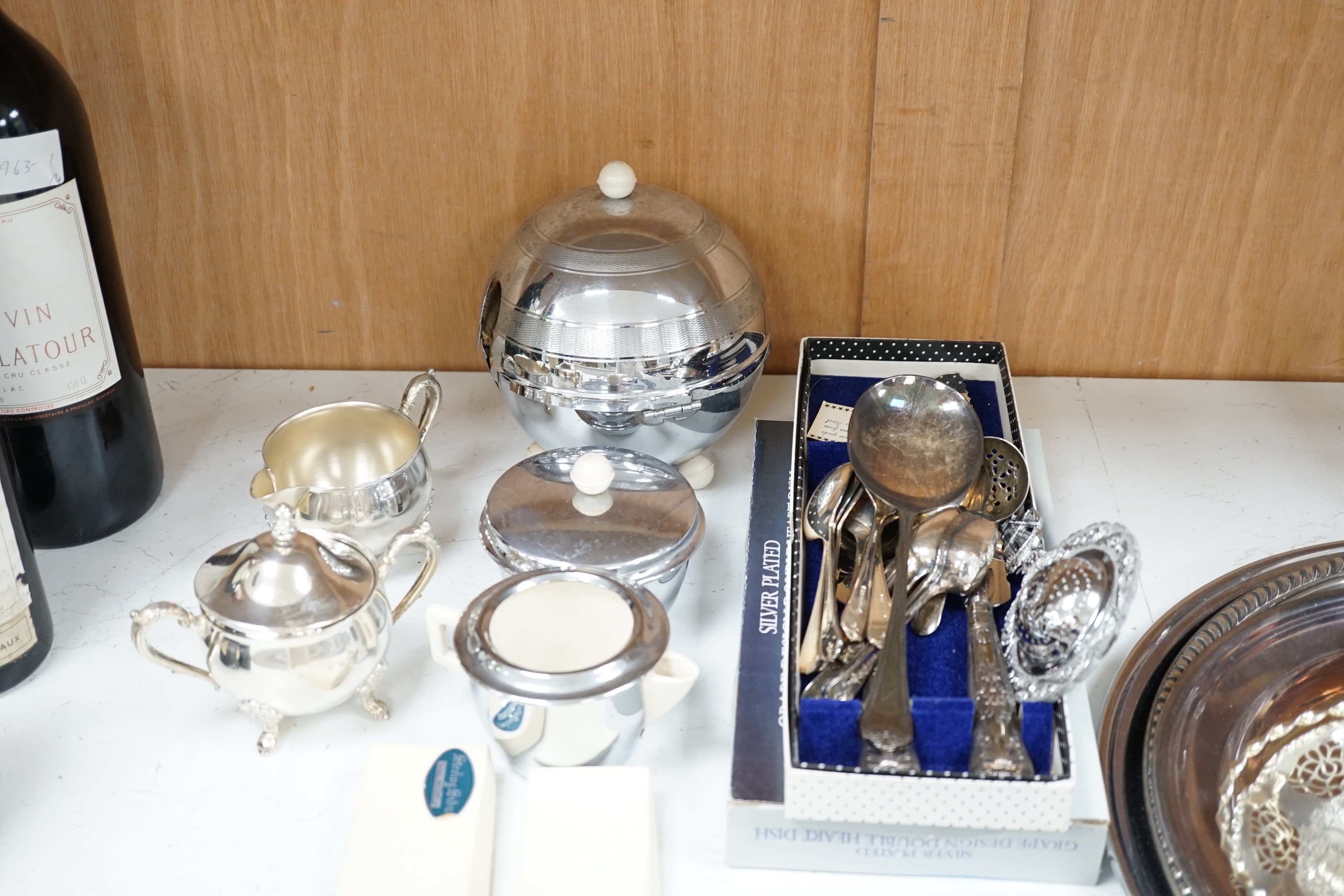 A quantity of silver plated wares (some with silver handles)